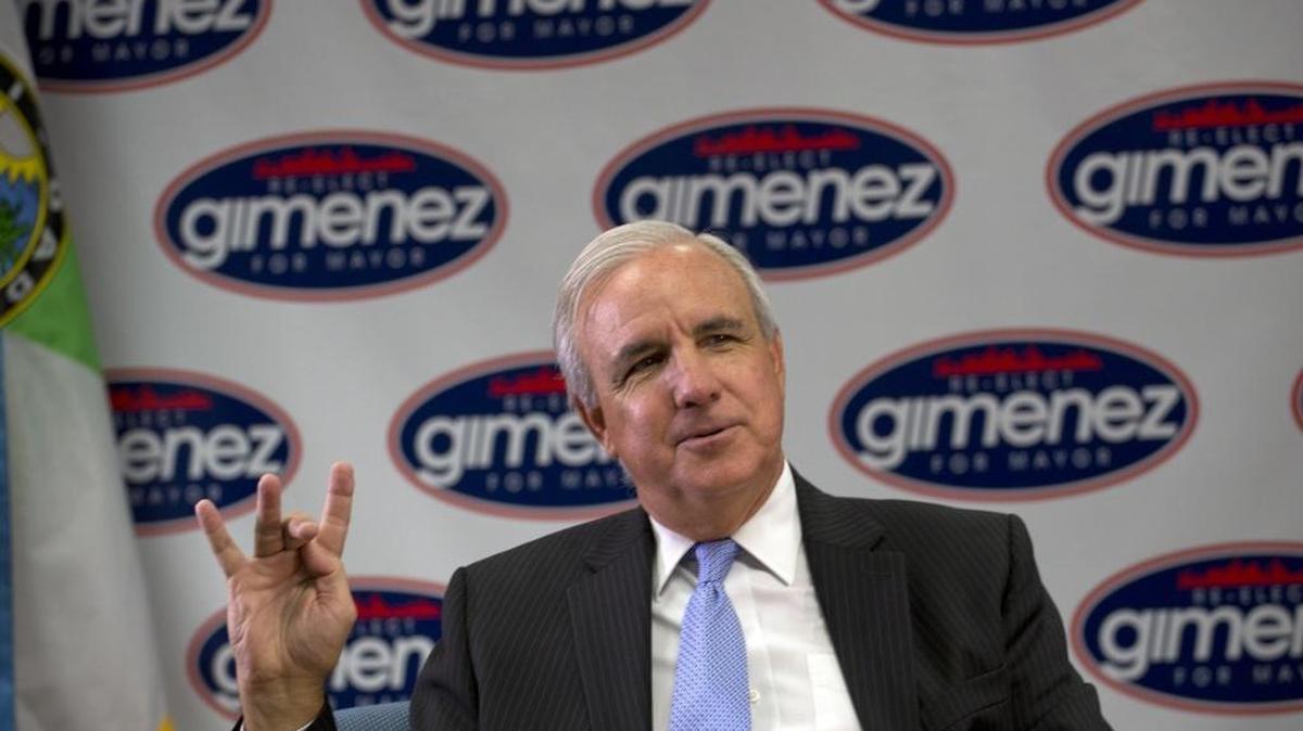 
Miami-Dade Mayor Carlos Gimenez counts off how long he's been in office on Thursday, Oct. 1, 2015. Gimenez formally filed for reelection Thursday.

