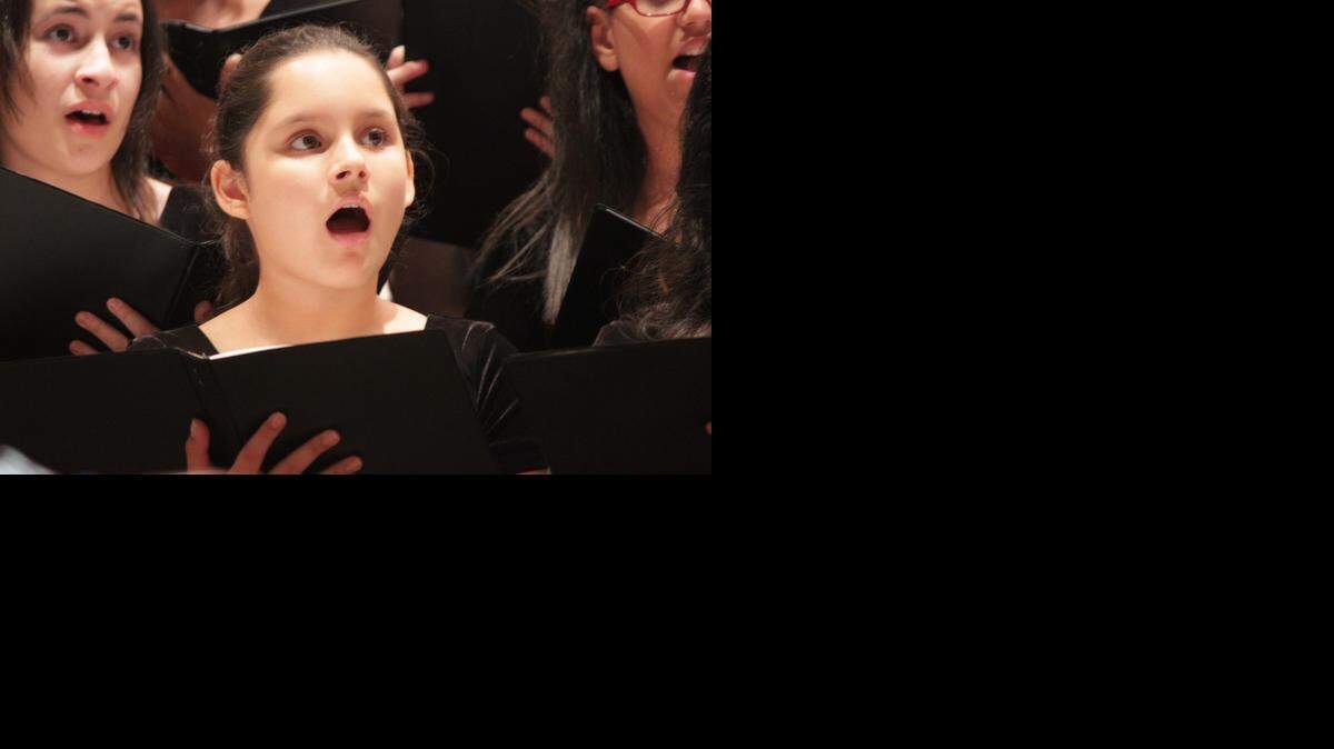 
Alejandra Vivanco, 13, an eighth grader at Jorge Mas Canosa Middle School, performs with Avanzato, Miami Children’s Chorus advanced singing group, to celebrate the programs 50th year anniversary on Oct. 25 at the Miami Beach Community Church located on 1620 Drexel Ave. 

