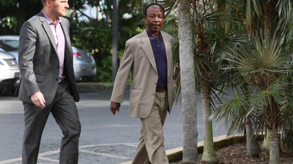 Miami's ousted internal auditor, Victor Igwe, (right) with attorney Ryan C. Brenton in 2015.
