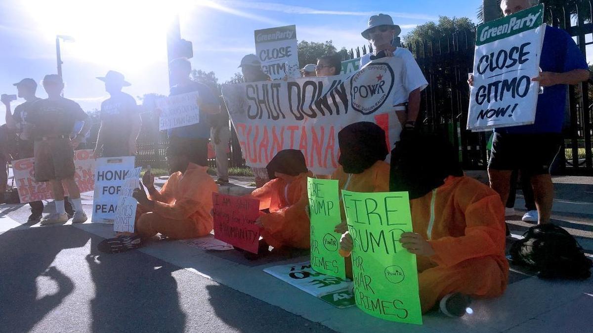 On the 15th anniversary of the Guantanamo Bay prison facilities, about 30 people walked to U.S. Southern Command demanding the prison’s closure.
