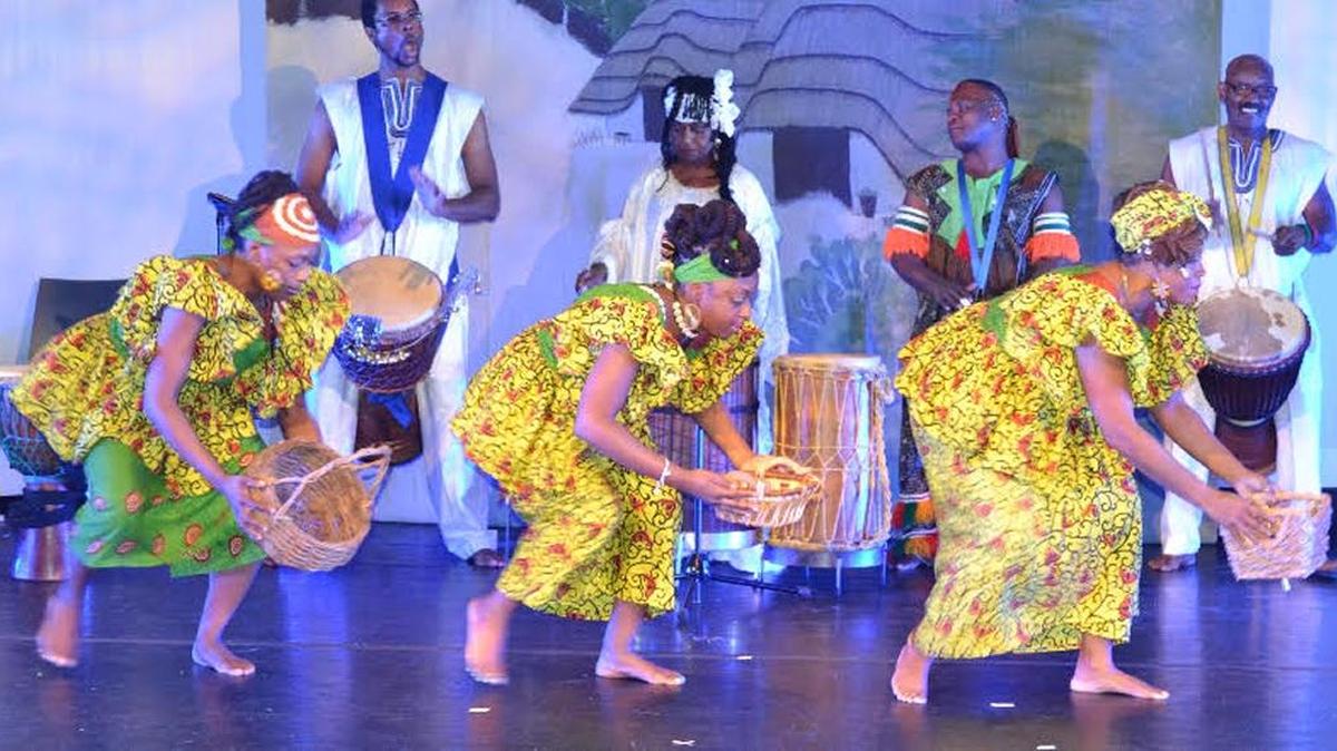 Delou Africa performs at the 2014 Kwanzaa celebration.