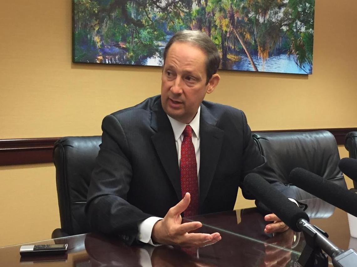 Senate President Joe Negron, R-Stuart, speaks with reporters after Miami Republican Sen. Frank Artiles formally apologized on the chamber floor Wednesday for insulting and using a racial slur against two black senators.