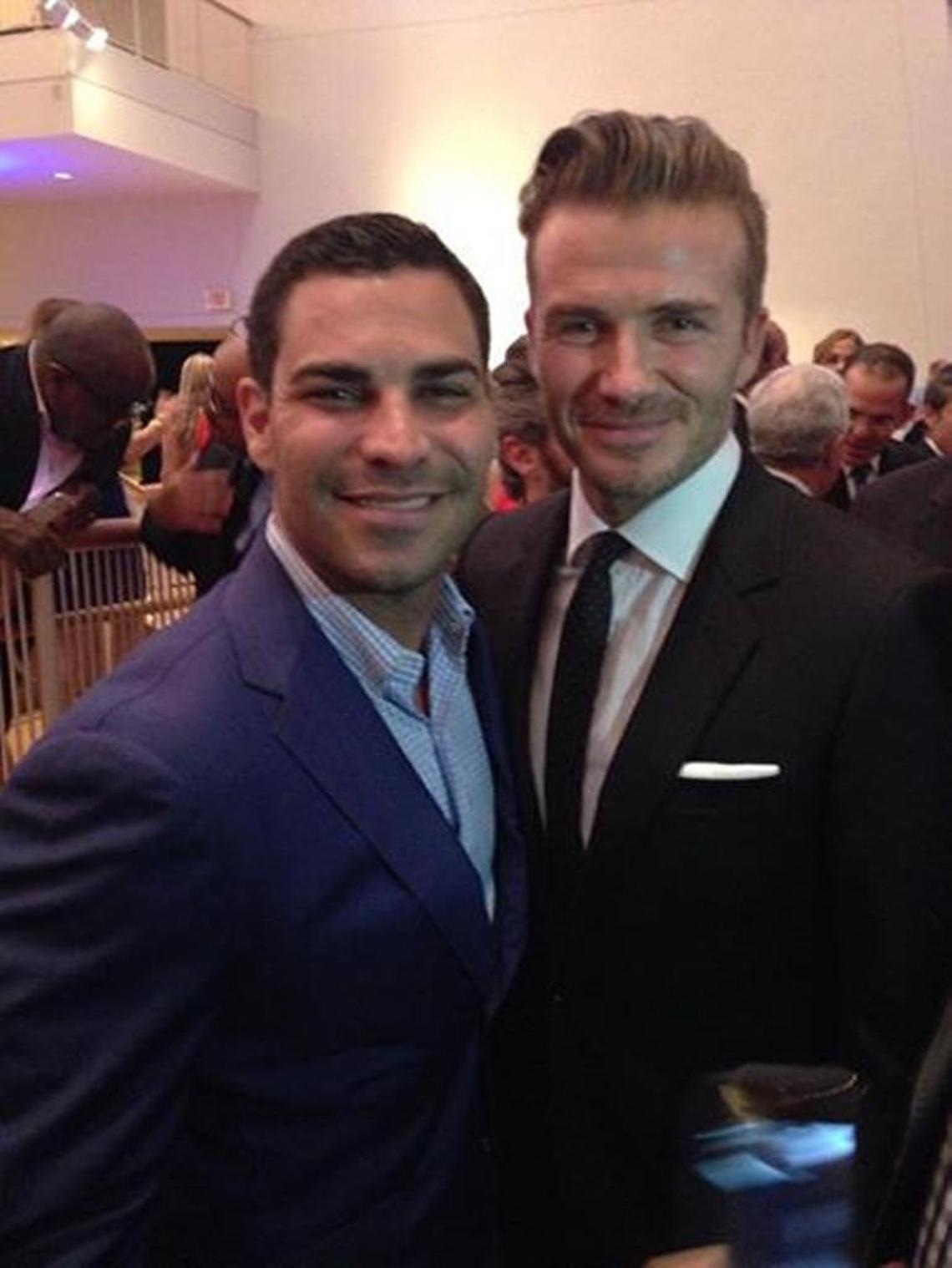 Francis Suarez poses with David Beckham at a reception on Feb. 4, 2014, back when Suarez was a city commissioner and Beckham was looking to build a soccer stadium in downtown.