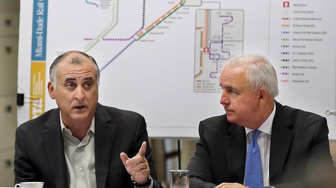 Miami-Dade Commission Chairman Esteban “Steve” Bovo, left, and Mayor Carlos Gimenez at a July 2015 discussion on the future of transit in Miami-Dade County. Bovo recently predicted transit woes would keep Amazon from picking Miami as the home to a new secondary headquarters.