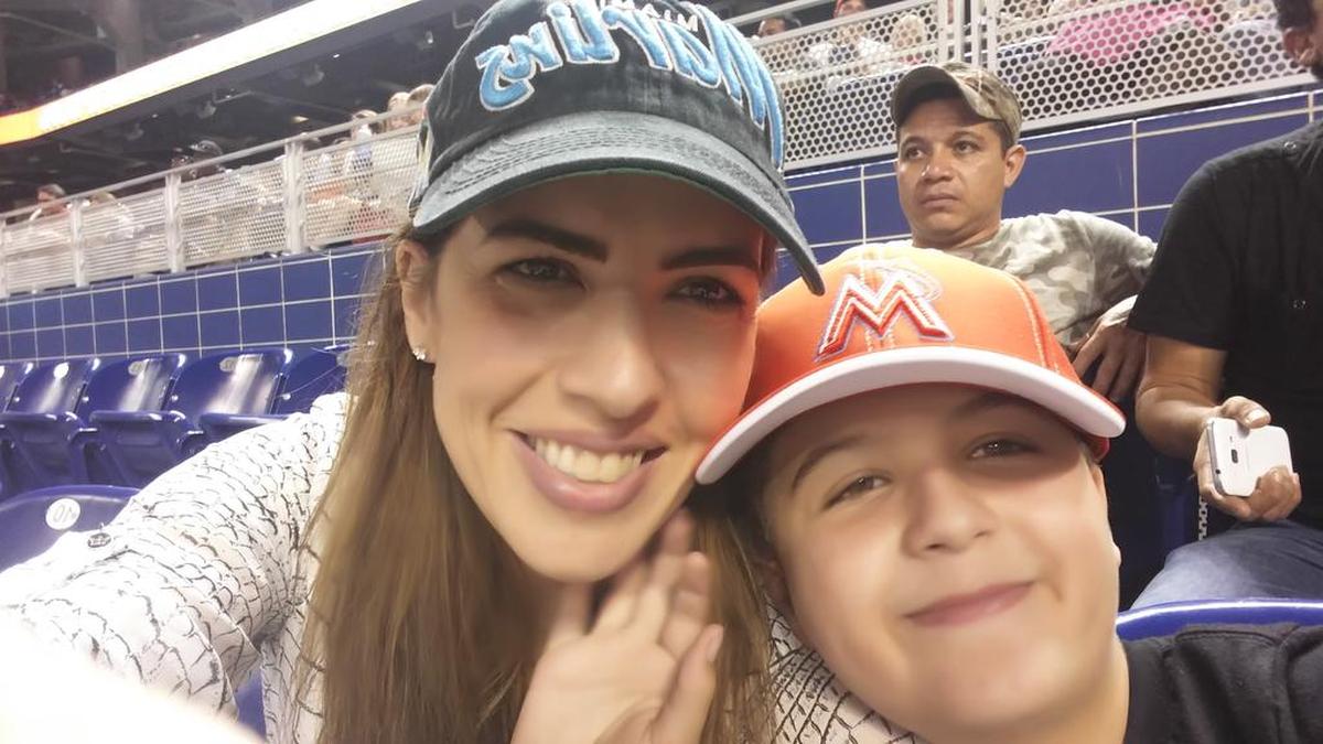 Miami-Dade mayoral challenger Raquel Regalado poses with her son, Sebastian, at Marlins Park in this undated family photo.