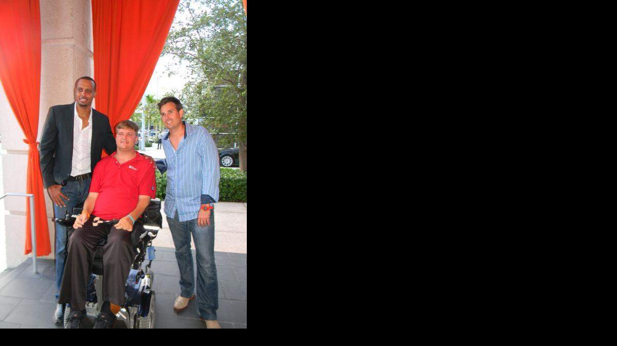 
From left, Peter Bailey, James “Woody” Beckham and Elvis Anderson pose after a Happy Hour meet-and-greet where Beckham spoke about the work of the foundation and shared his story. 
