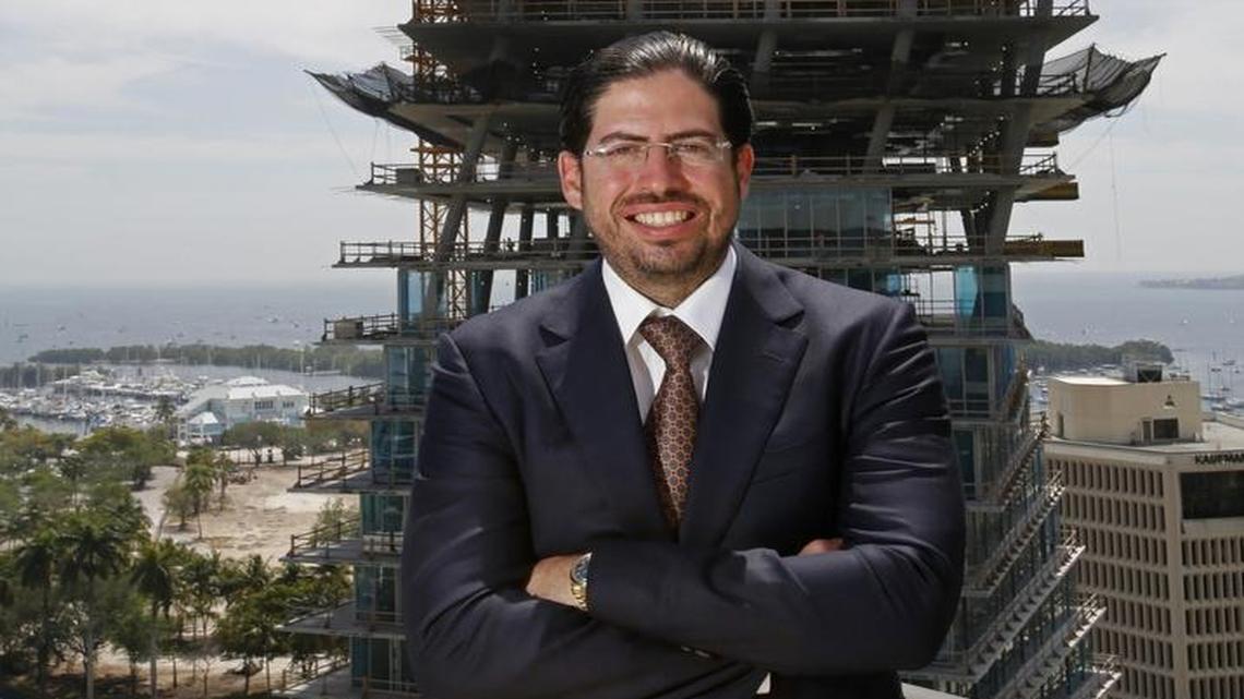 Terra Group president David Martin in 2015, with the Grove at Grand Bay in the background. Terra Group is looking to buy dozens of properties on Grand Avenue.