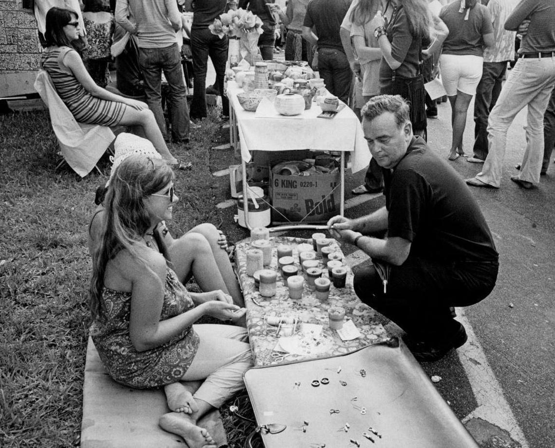 Rev. Allen Hingston of St. Stephen's Episcopal Church views wares sold at hippie gathering on October 4, 1970.