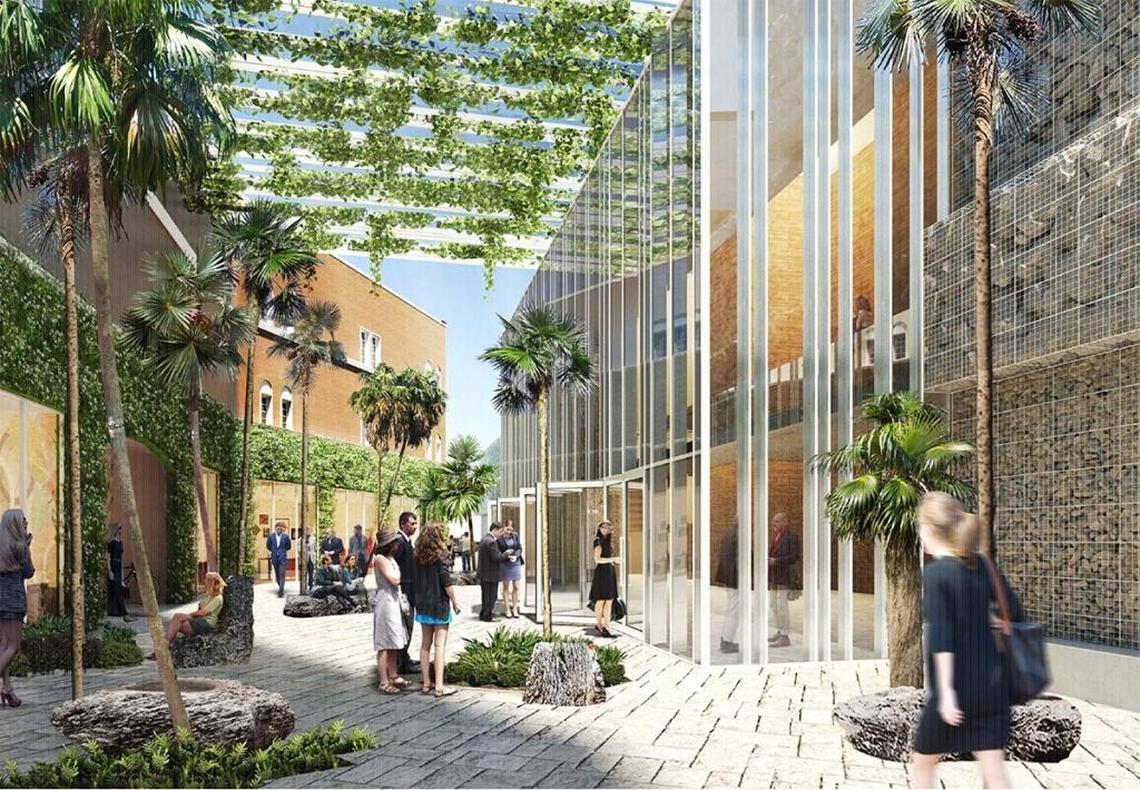 An architectural rendering shows the restored front building at the Coconut Grove Playhouse to the left, with a free-standing new theater at the right.