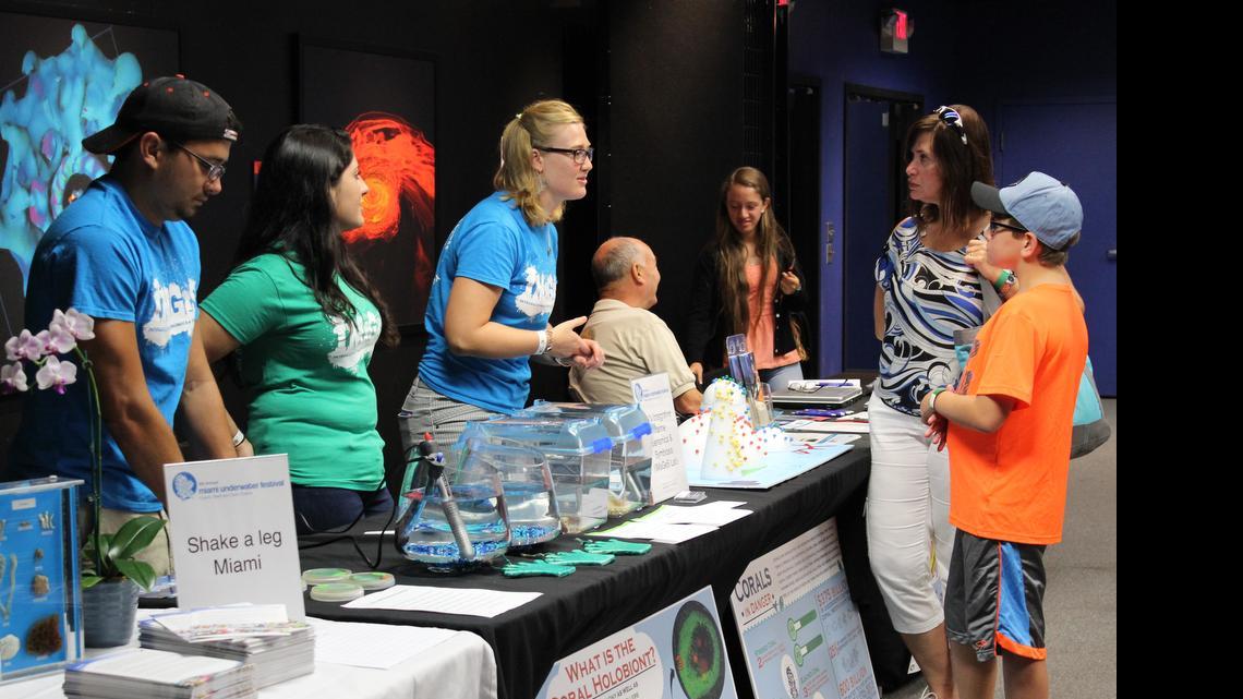 
Ellen Down, 23, a student from Florida International University, talks about coral reefs and sea anemones in their natural habitat. 
