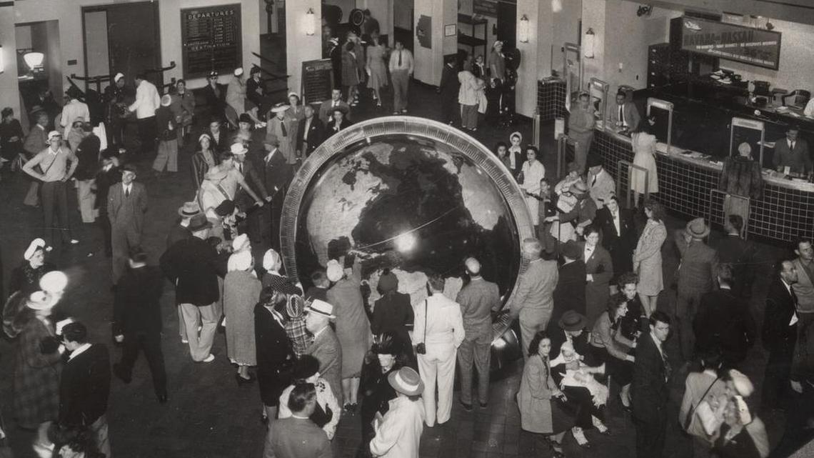 Visitors crowd around the globe of the world at the Pan Am seaplane terminal in Coconut Grove, now Miami’s City Hall, in the mid-1930s. 