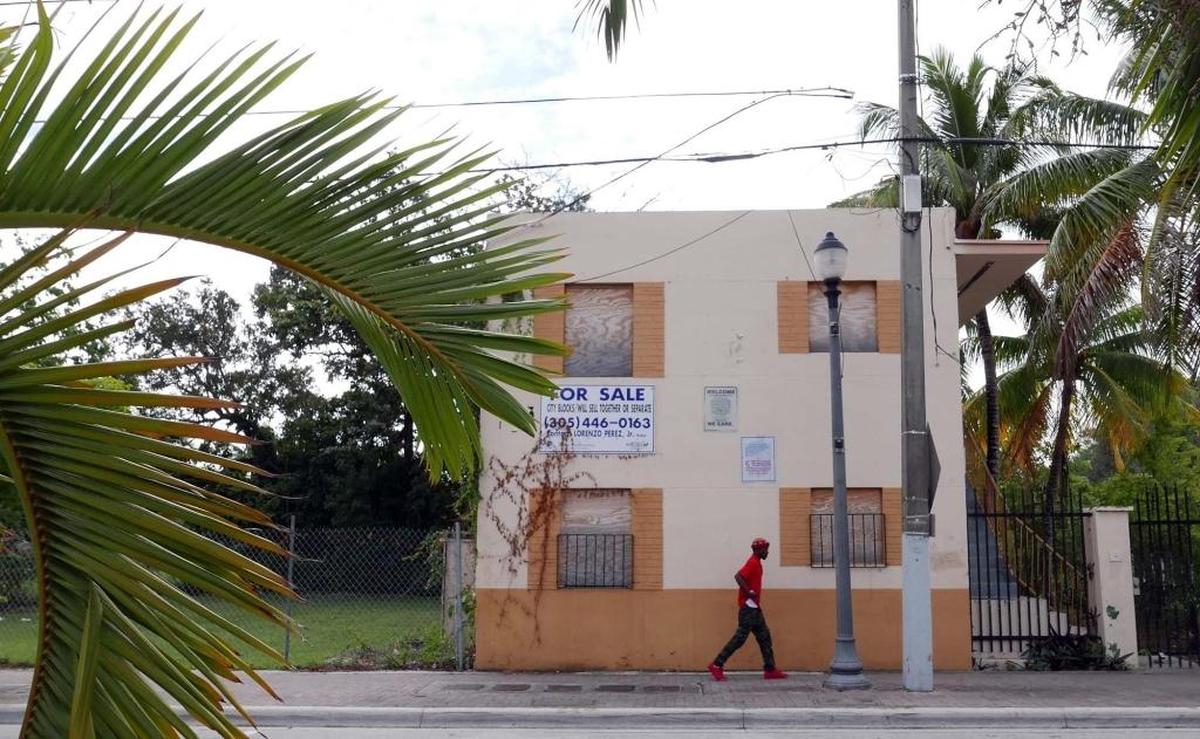 A boarded-up building at 3440 Grand Avenue in West Coconut Grove, seen on December 2, 2016, was part of a large assemblage of properties in the historically black community slated for a long-stalled redevelopment.