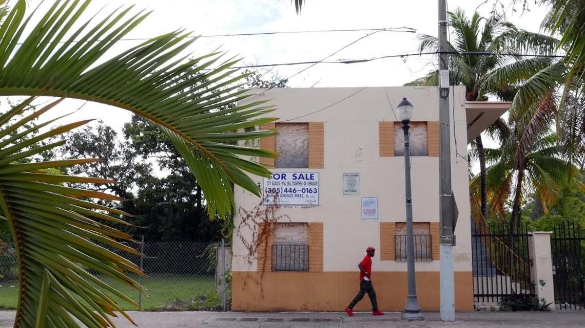 A boarded-up building at 3440 Grand Avenue in West Coconut Grove, seen on December 2, 2016, was part of a large assemblage of properties in the historically black community slated for a long-stalled redevelopment.