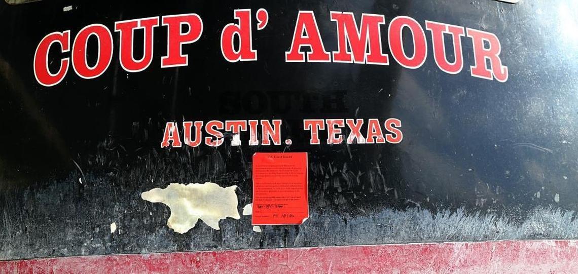 U.S. Coast Guard notice posted on one of the boats that were washed ashore into the backyard of Coconut Grove resident Jessica Ivler.