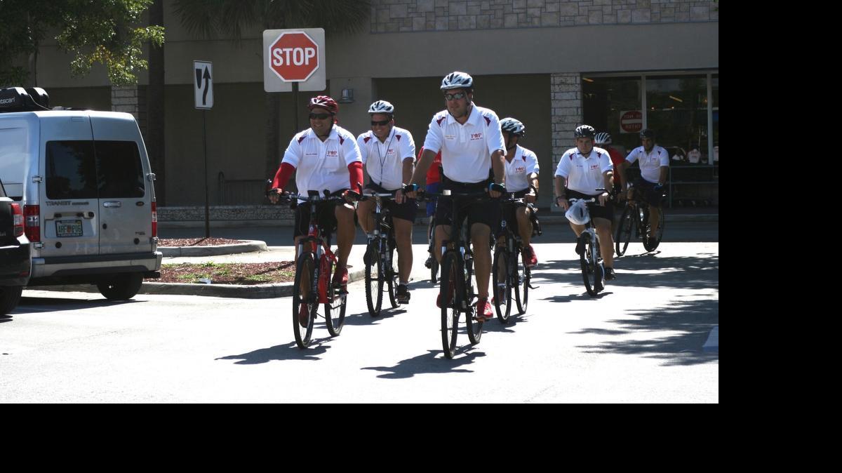 
Raymond Rodriguez-Torres, left, practices with police officers led by Lt. Javier Ortiz, right, for their bike ride to Walt Disney World in memory of his daughter, Bella Rodriguez-Torres.
