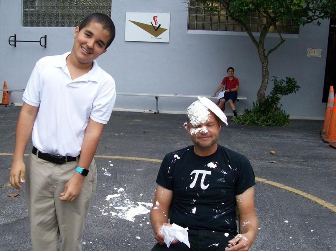 In just over two and a half minutes, 12-year-old Manny Abrante can rattle off 576 digits of Pi. His prize was the chance to pie his math teacher. Philip Gentles, in the face.