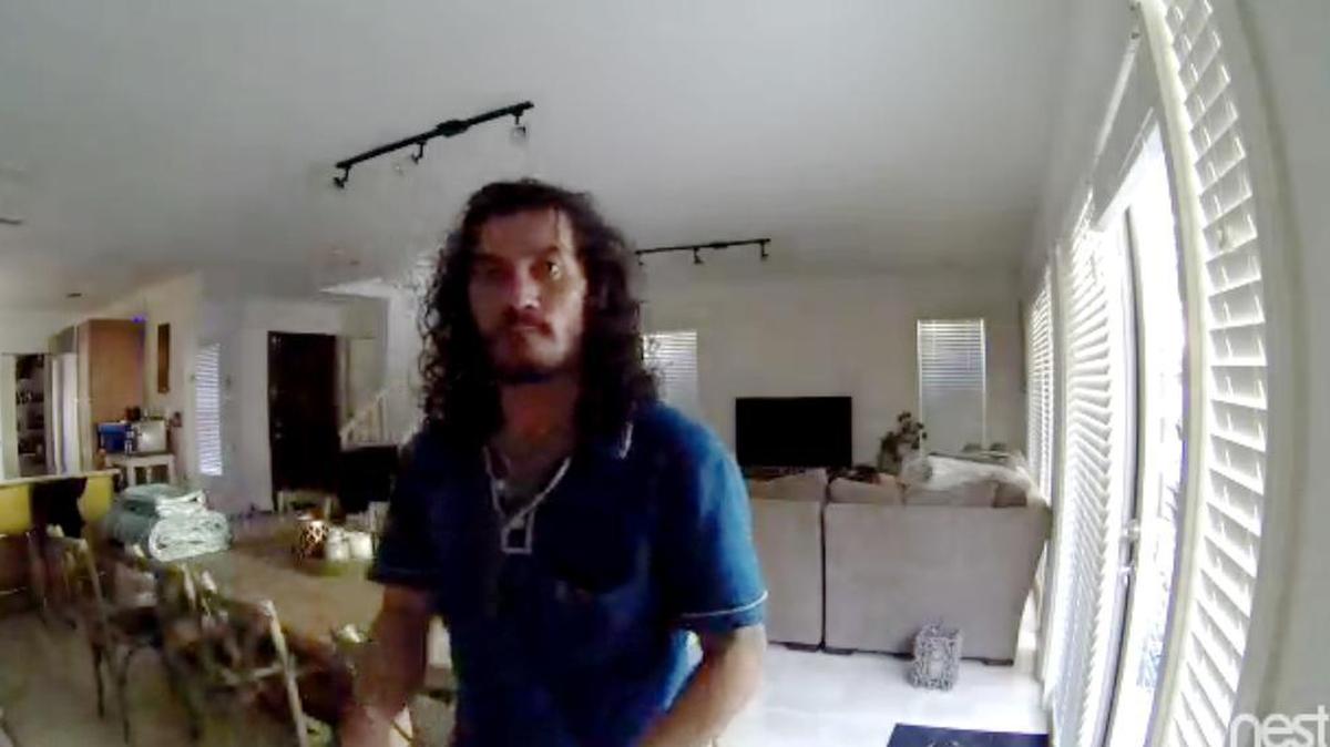 A suspect in an occupied burglary in Coconut Grove is seen in this frame-grab from a surveillance video released Thursday, Dec. 24, 2015, by the Miami Police Department's Burglary Unit.