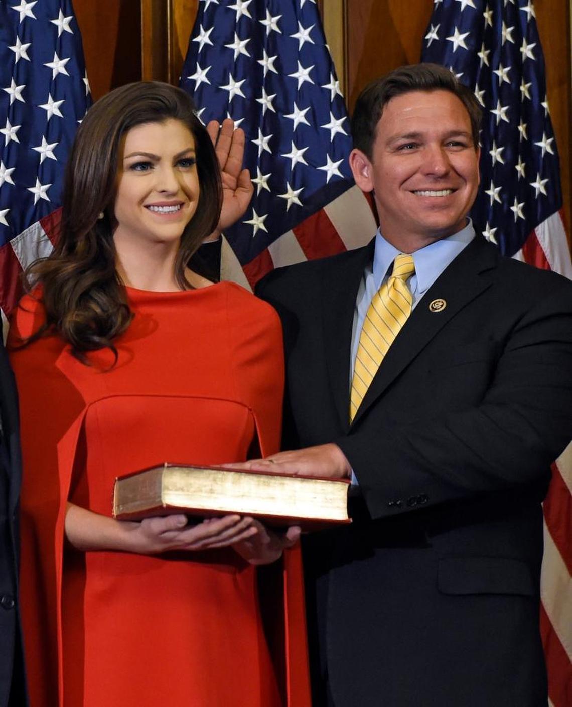 Rep. Ron DeSantis, R-Fla., and his wife, Casey Black DeSantis, re-enact the oath of office in 2015 on Capitol Hill in Washington.