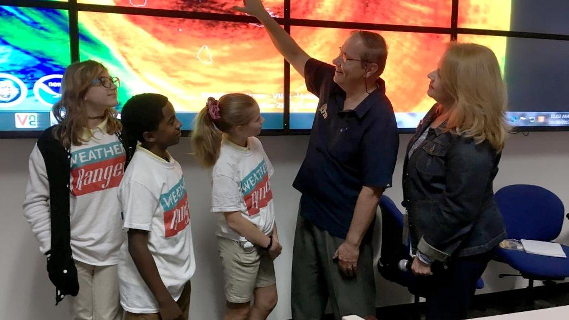 At the StormZone simulation, from left, Weather Rangers student meteorologists Simona Sartan, Alfred Harris and Kristina Filippova track Hurricane Irma with Florida International University’s Erik Salna and Miami-Dade Emergency Management’s Mirtha Gonzalez.