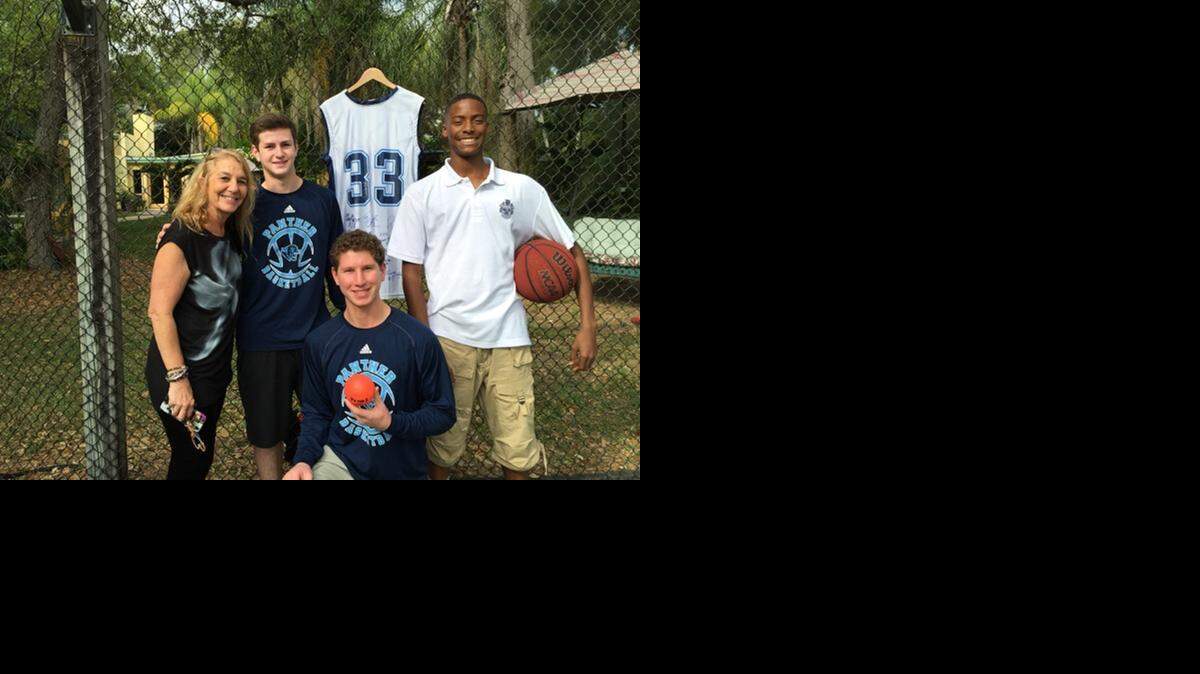 
Getting ready for the Miracle Games and “3’s for Z,” in memory of Zander Standiford, are Kimberly Standiford, Matt Hellinger, Jonathan Roth and Jayden Hardaway. Zander’s high school jersey has been signed by NBA stars.
