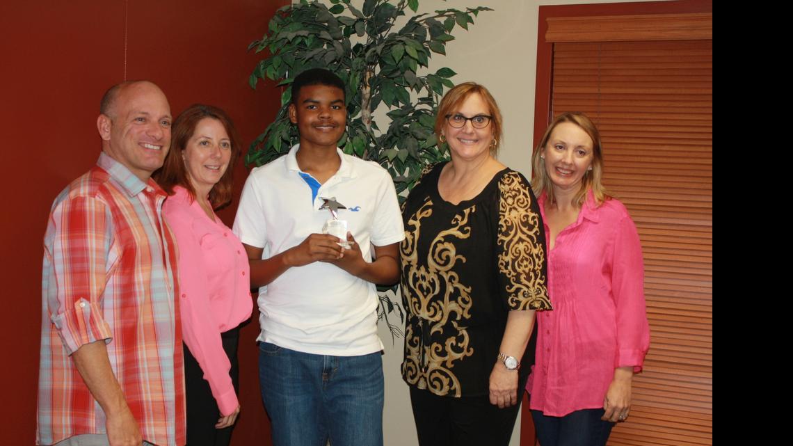 
From left, Executive Director Michael Alessandri, clinical director Jennifer Durocher, Connor Cunningham, associate director Diane Adreon and associate director Melissa Hale at the Outstanding Student Volunteer award presentation for the University of Miami Center for Autism and Related Disabilities (UM-CARD).
