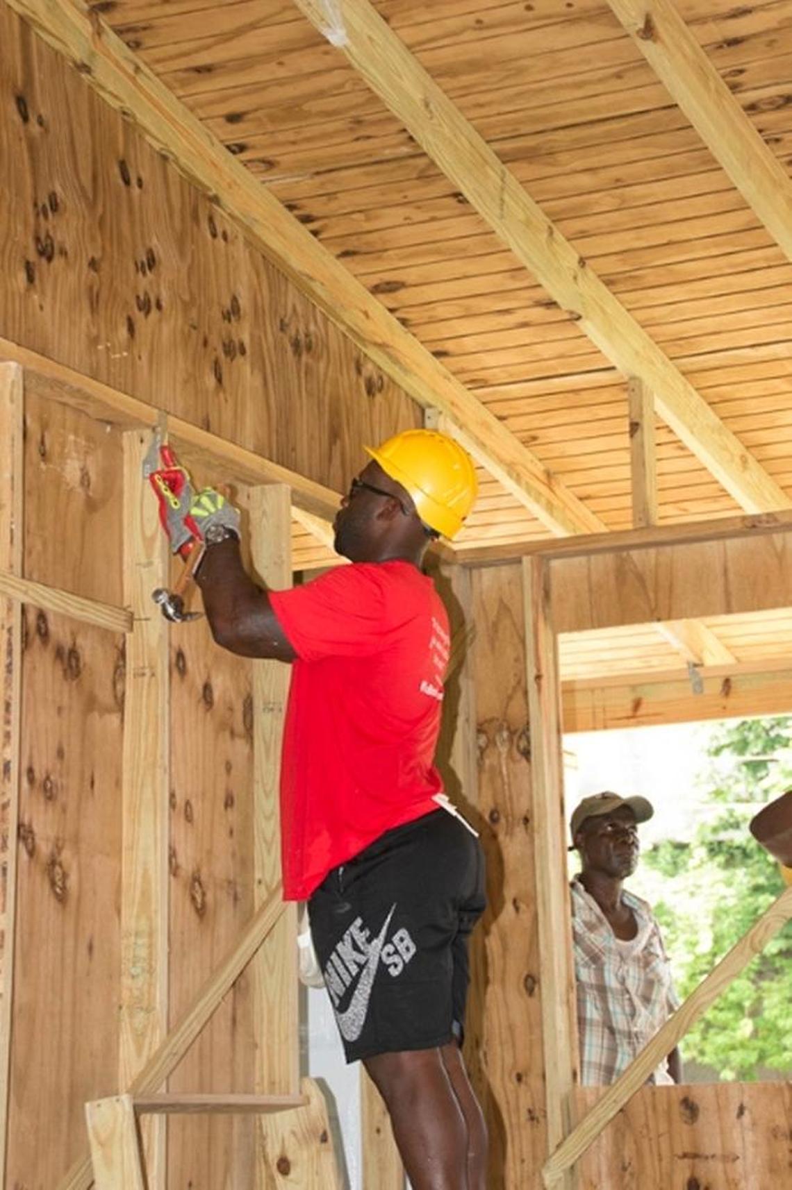 Stephen Tulloch working on building the Little London Infant School. It is the first infant school in Little London, Jamaica.