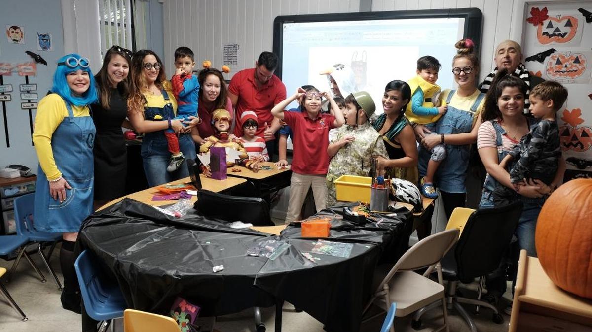 Among the magical worlds of ‘Frozen,’ Minions, superheroes and monsters, Mary Snow, executive director of the Coral Gables Foundation, enjoys the Halloween celebration at Crystal Academy in Coral Gables. The foundation’s grant allowed the school to purchase advanced tools for students with learning challenges.