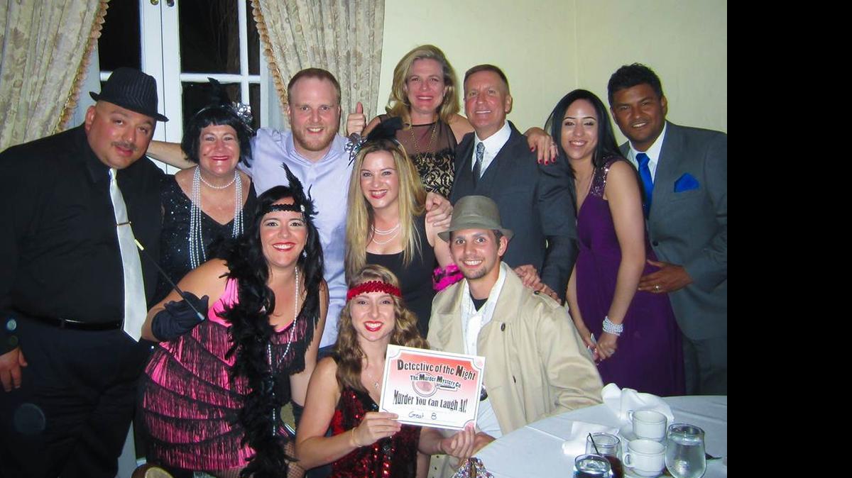
Law firm Ratzan & Faccidomo hosted a Murder Mystery Dinner to raise money for Dade Legal Aid's children's legal services. The winning team that solved the mystery are, back row from left: Paul J. Scanziani, Karen Ladis, Jody Vining, Jaime Vining, Alison Harke, Lance Harke, and Melody Montero and Jesus Montero. In front, from left, are Denise Martinez-Scanziani, Alex Quinn and Josh Holt.
