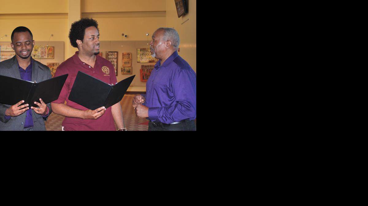 
2015 Bethune-Cookman University student performers Ray Champagne, Joshua Bivins and director Leroy Meadows rehearsing for the 50th collaborative high school reunion presentation
