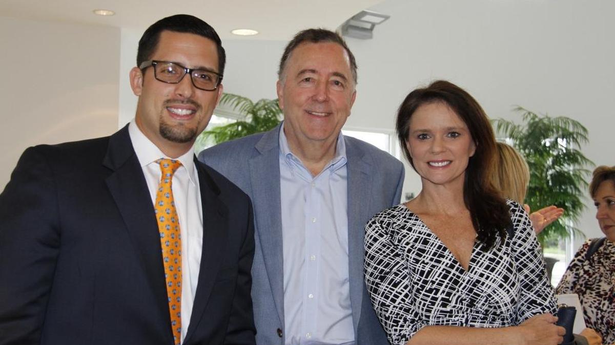 Danny Cartaya, Tom Whitehurst and Loreen Chant celebrate the new local nonprofit organization Work for America that helps create employment and residential opportunities for adults with special needs.