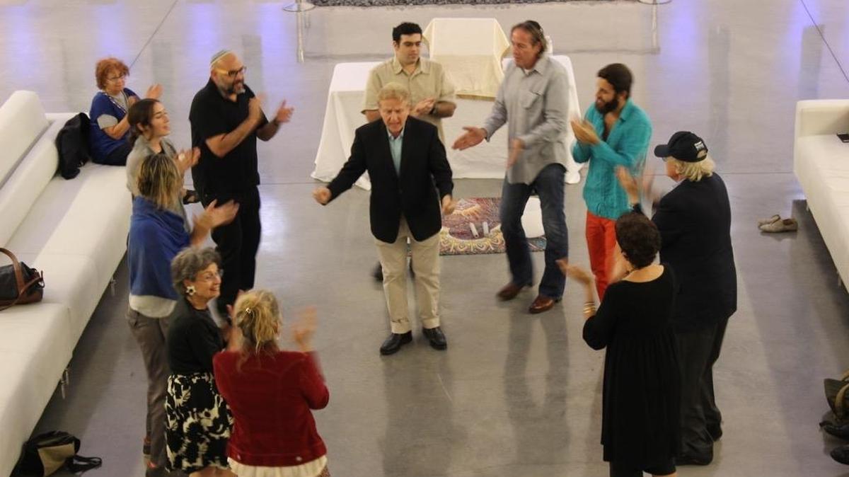 Rabbi Sam Intrator at The Temple House in South Beach leading an inspirational program on making prayer more accessible for contemporary audiences.