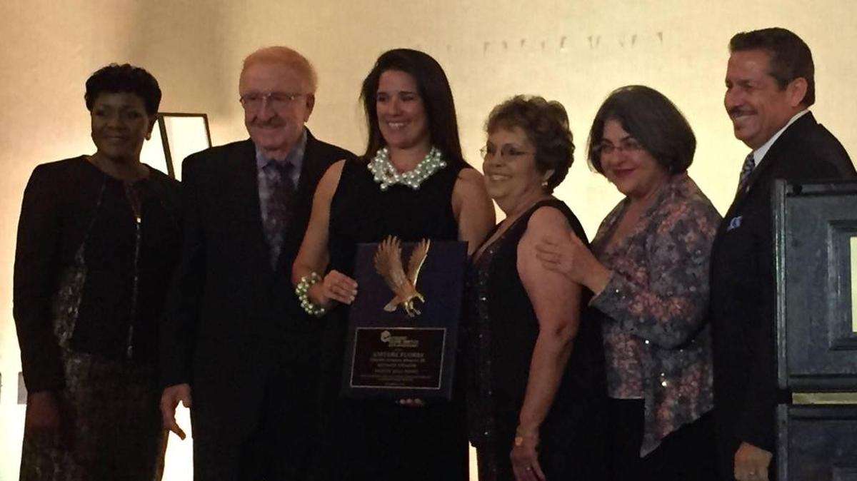 
Masquerade Ball: Florida Sen. Anitere Flores, R-Miami, receives a Citizen’s Crime Watch of Miami-Dade County award Oct. 2. She is flanked by Miami-Dade County Commissioner Audrey Edmonson, retired Miami-Dade Police Chief Irv Heller, Carmen Gonzalez Caldwell of Crime Watch, and Miami-Dade Commissioners Daniella Levine Cava and Jose ‘Pepe’ Diaz. 

