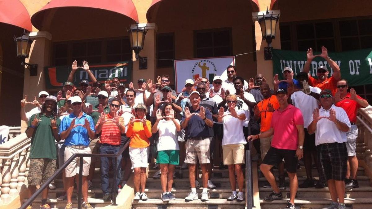 
A group of sports greats gather in celebration during the 2014 University of Miami Sports Hall of Fame Celebrity Golf Tournament at the Biltmore Golf Course.
