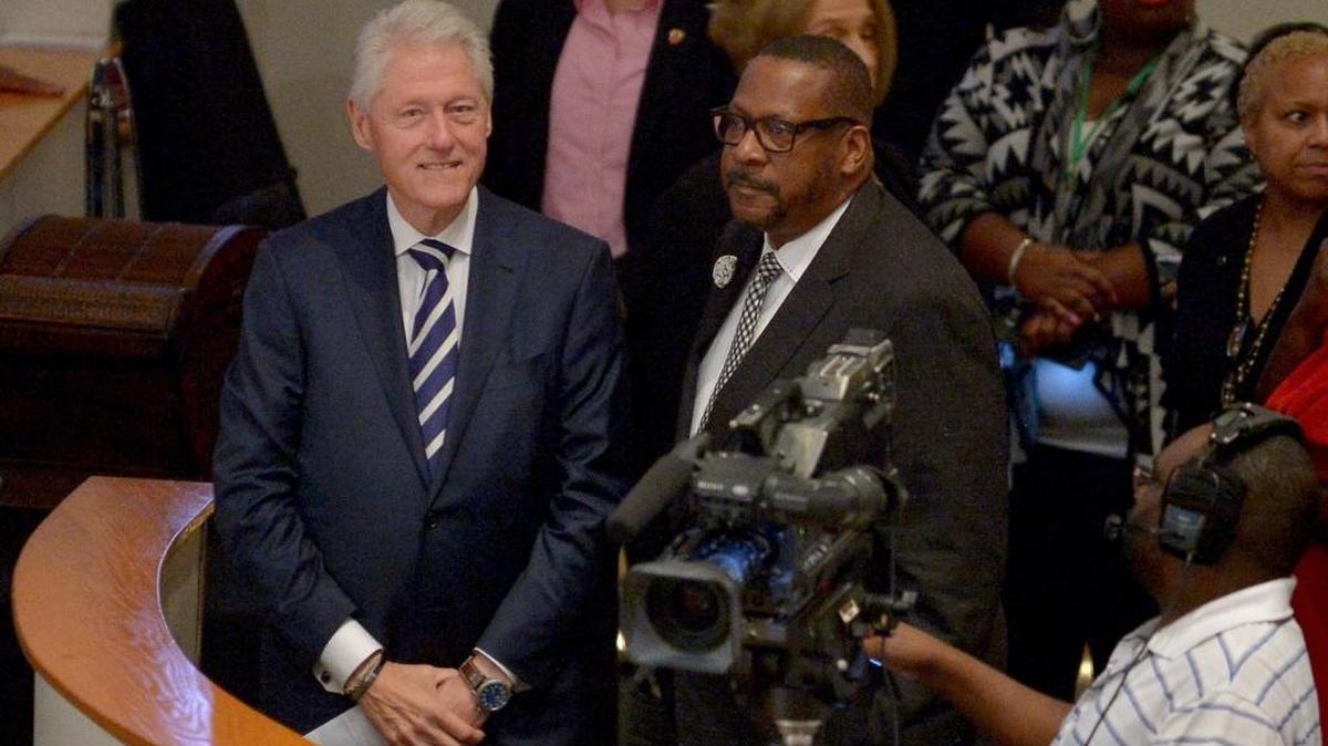 Former U.S. President Bill Clinton and Bishop Victor T. Curry attend New Birth Baptist Cathedral of Faith International on Sunday Oct. 23, 2016 in Miami, Florida.