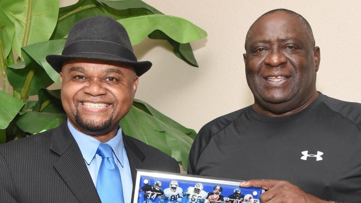 Miami artist Carl Latimore and football great Larry Little.