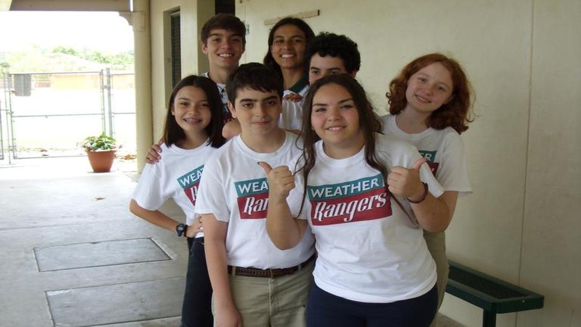 Young Weather Rangers at South Miami Middle Community School show off their new T-shirts and are excited to learn about weather preparedness through StormZone’s latest community involvement program.