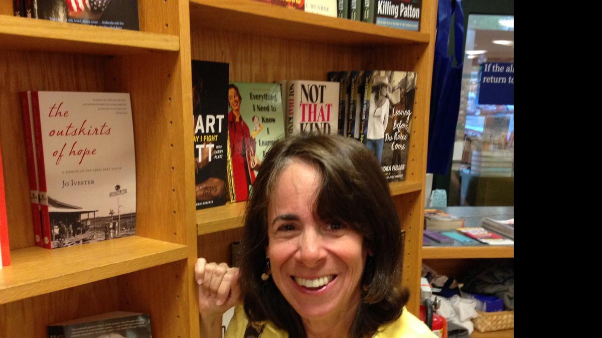 
Jo Ivester with her book, ‘The Outskirts of Hope,’ which tells her mother’s stories and her own as a 10-year-old in rural Mississippi.
