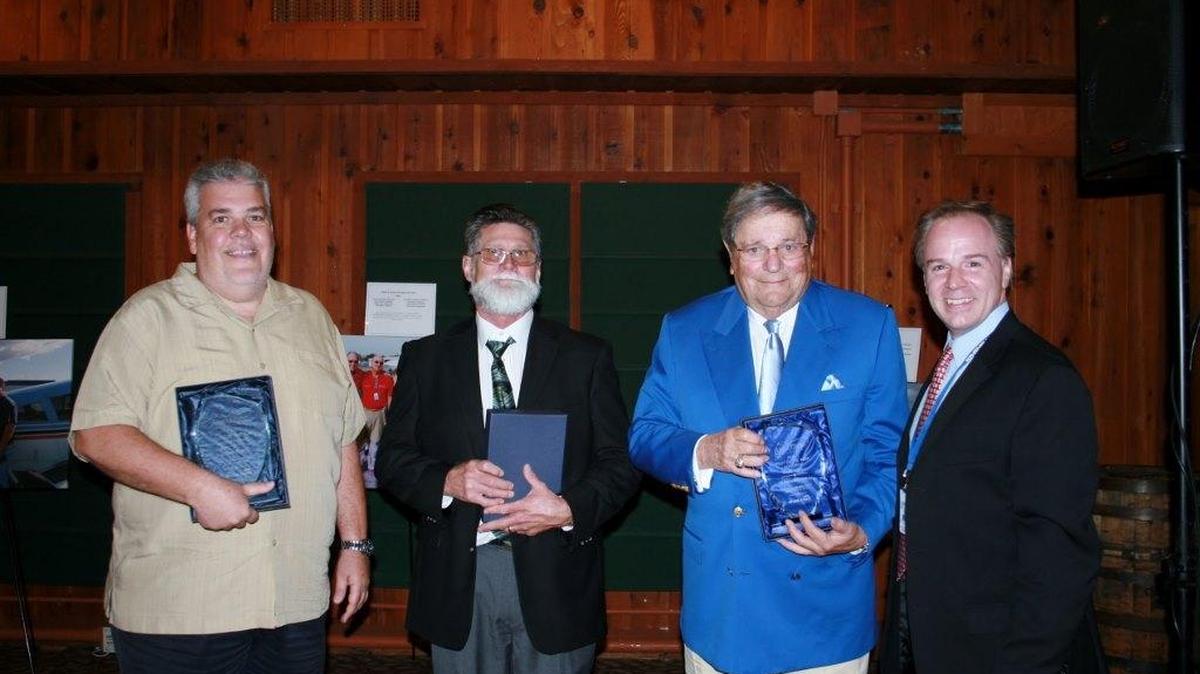 Angel Flight Southeast named Kendall resident David Rivero, on left, the 2015 Pilot of the Year for the South Florida region. Pictured with Rivero, from left, are Pilot of the Year honorees Marc Snell, Manfred Brecker and Angel Flight Southeast CEO Steve Purello.