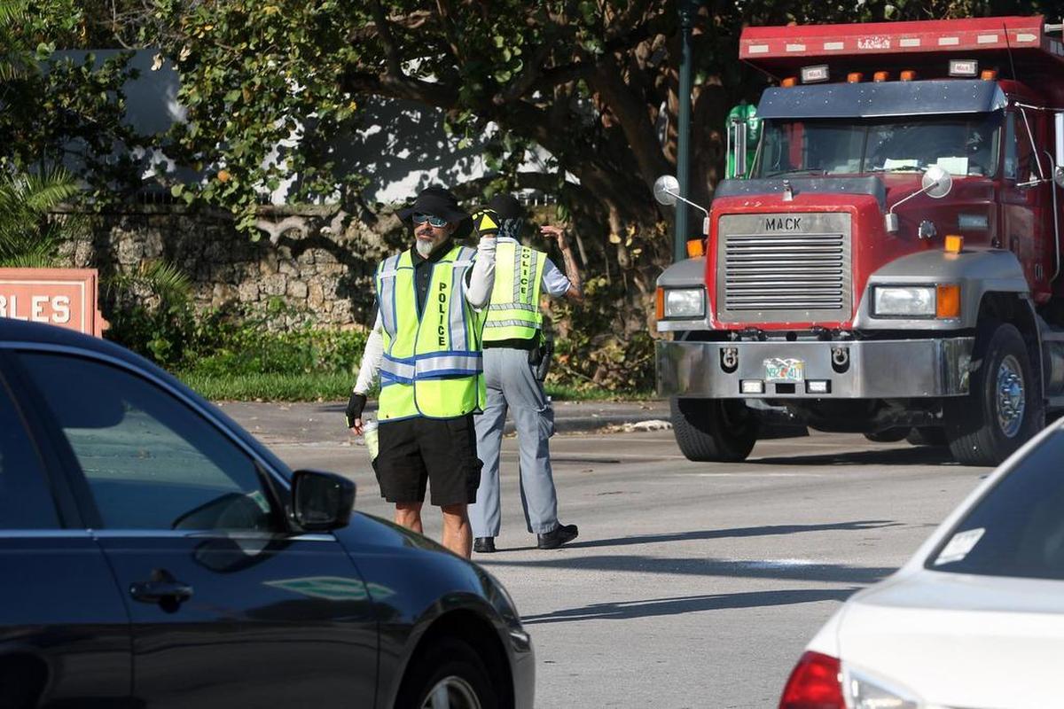 Police officers direct traffic at Alhambra Circle and Eighth Street after Hurricane Irma.