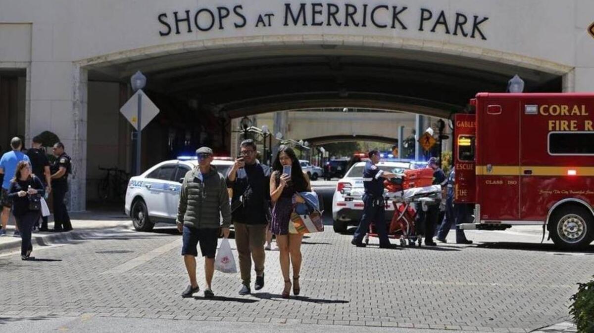 Police block off an entrance to the Shops at Merrick Park following a shooting on April 8, 2017.