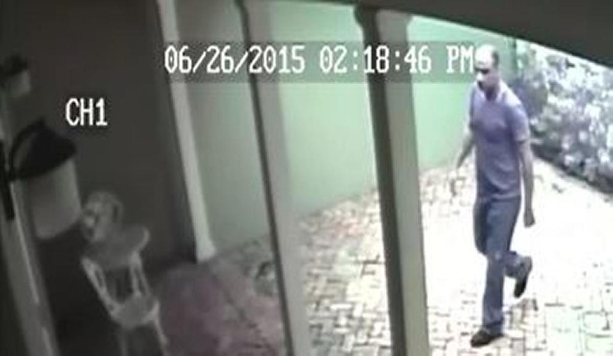 A man caught on surveillance cameras steals a package from a home in Coral Gables.
