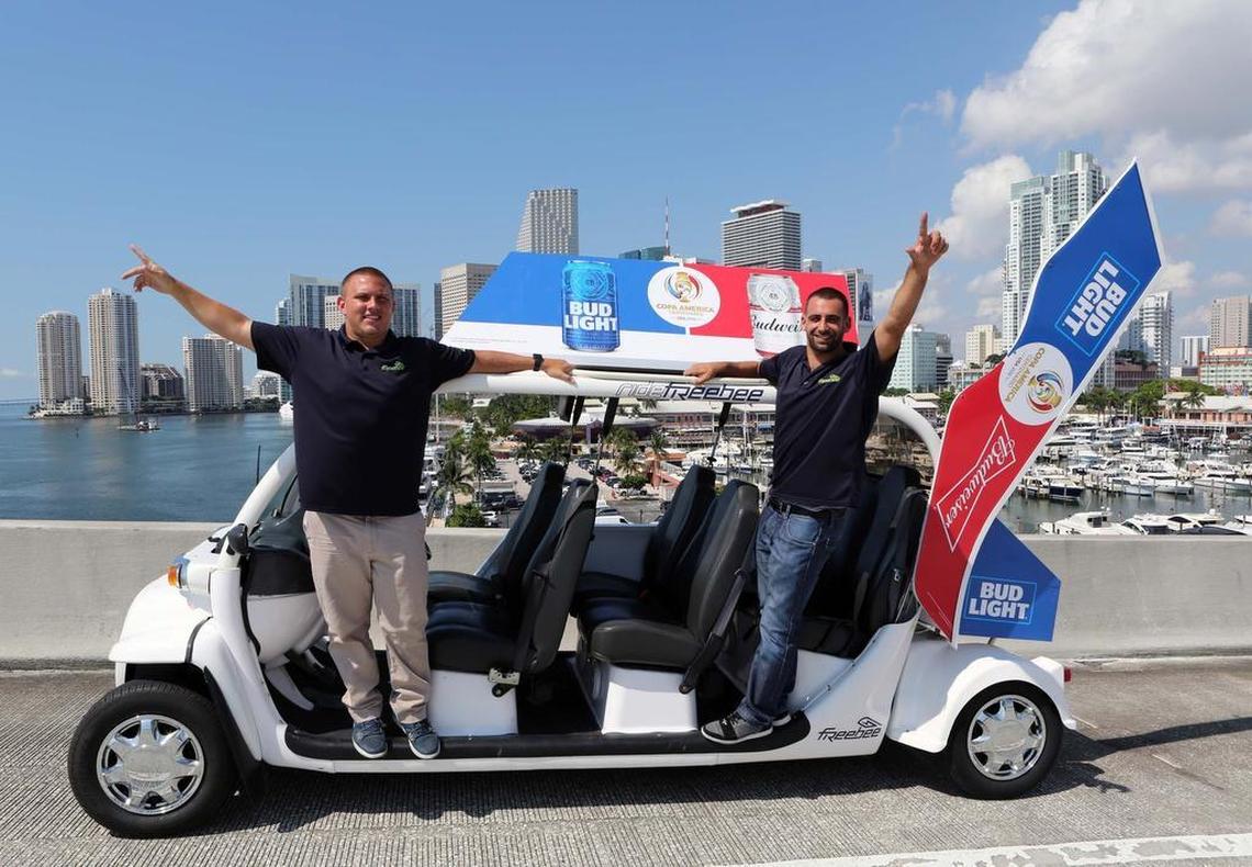 Jason Spiegel (right) and Kris Kimball, (left) in 2012 started Freebee, a free transportation service designed for short trips. In June, the city of Coral Gables contracted with the company for a one-year experiment.