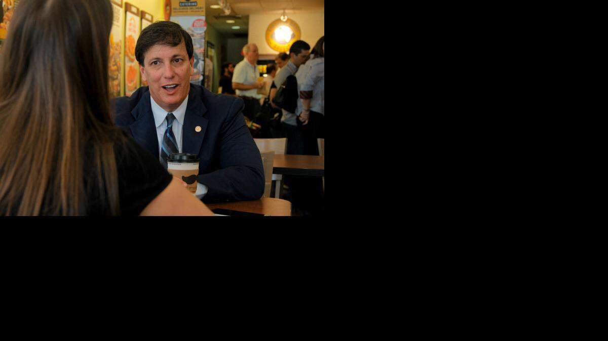 
Coral Gables Vice-Mayor Bill Kerdyk meets with Coral Gables Community Foundation executive director Mary Snow at his favorite coffee shop, Einstein Bros Bagels, on Friday, April 10.
