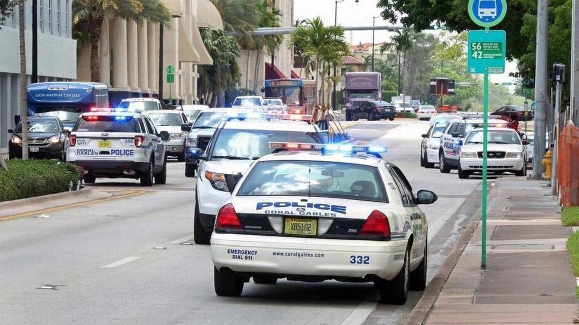 City of Coral Gables Police block off LeJeune Road and Valencia Avenue in Coral Gables on Friday, May 26, 2017.