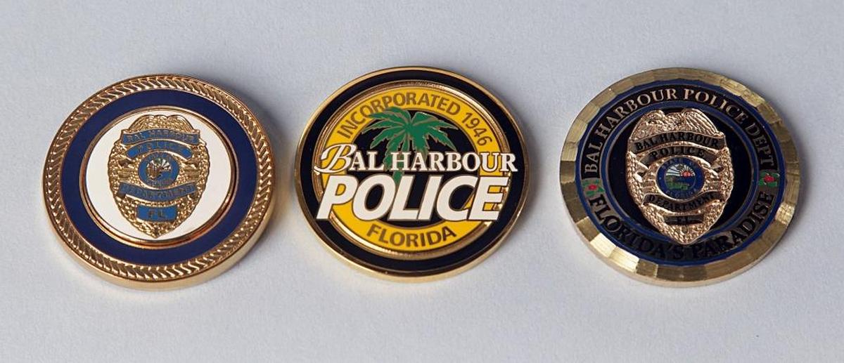 With the millions from his Tri-County Task Force, former Bal Harbour police chief Tom Hunker purchased knickknacks big and small to hand out, including these coin keepsakes.