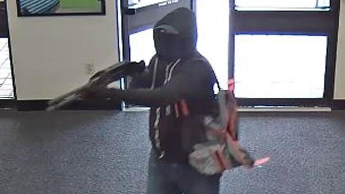 The FBI released photos of an armed robber who investigators say hit a TD Bank branch at bank 720 NW 57th Ave. Sunday afternoon.