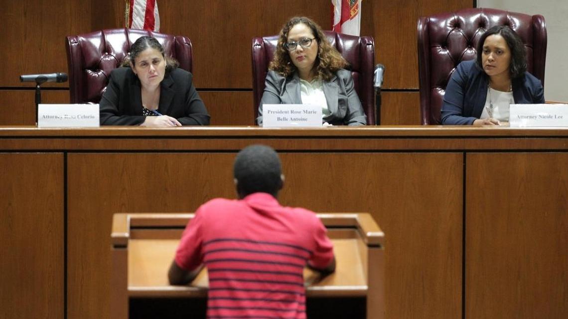 
Cedric Thornton, 19, gives his statement of false arrest to Commissioners Rosa Celorio, left, Rose Marie Belle Antoine, and Nicole Lee from the OAS civil rights branch during a meeting Monday 
