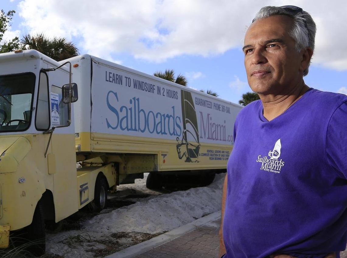 Ovidio and Karen DeLeon have run Sailboards Miami off Hobie Beach, just past the Rickenbacker Causeway, for decades teaching windsurfing and offering an attraction for locals and tourists. Hurricane Irma caused that stretch of the beach off the causeway to be closed, likely until next May, but beyond the storm’s impacts on their business they were also passed over for a Miami-Dade County contract to continue their windsurfing business.