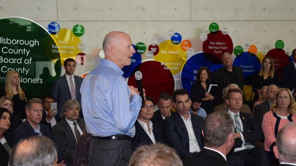 Gov. Rick Scott visited the Museum of Science and Industry in Tampa on Feb. 13 to defend funding Enterprise Florida and Visit Florida.