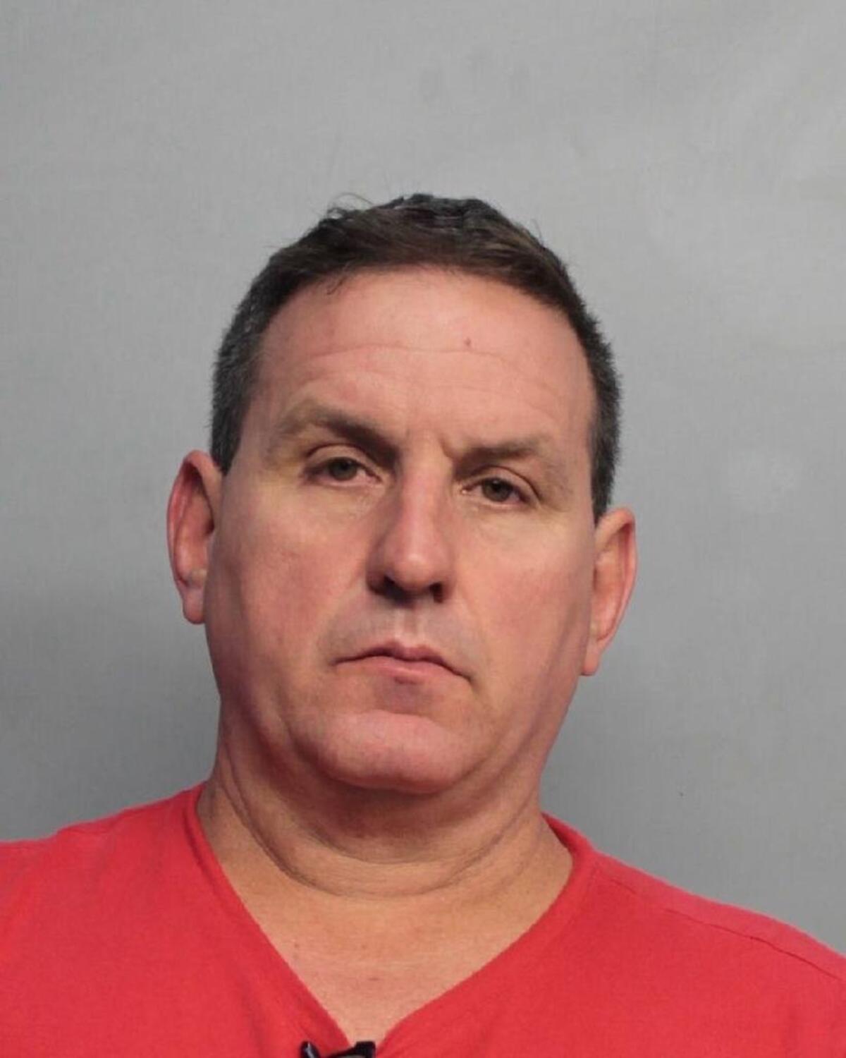 Ruben Lopez, 47, is accused of benefiting from rigged auctions conducted by his girlfriend, Mirtha Morejon, a county employee. The two later married.